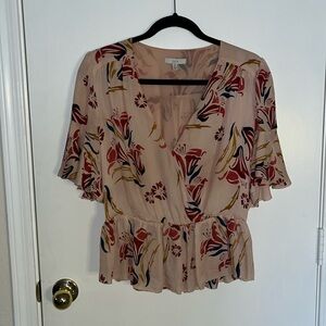 Super cute light pink blouse with wide sleeves and empire waist